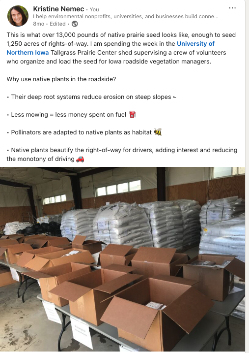 Shed with piles of bagged seed and cardboard boxes on a table with smaller bags of seed in them